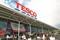 Tesco has delivered an improved performance over Christmas and unveiled the appointment of Halfords boss Matt Davies and the closure of its Cheshunt head quarters.