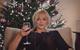 The mother in the ad is pictured relaxing after a happy but hectic Christmas Day